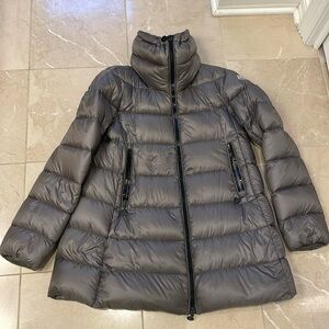 Moncler thigh leng winter coat.